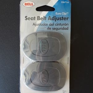 Seat belt adjuster